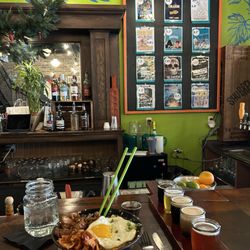 ShuBrew Handcrafted Ales and Food - Rice bowl + fried egg with a flight of amazing craft beers.