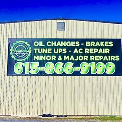 Phoenix Auto Repair - Phoenix Auto Repair Interstate Facing Side of Building. We Fix Everything.