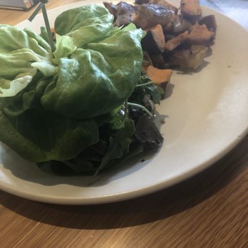 True Food Kitchen - Grass-fed Burger* with lettuce wrap and sweet potato hash - New American Near Me - Boca Raton, Florida