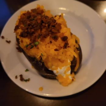WSW Steakhouse - TON of cheese on the loaded baked potato, I love cheese but this was way too much! - Steakhouses Near Me - Hilo, Hawaii WSW Steakhouse - TON of cheese on the loaded baked potato, I love cheese but this was way too much! - Steakhouses Near Me - Hilo, Hawaii