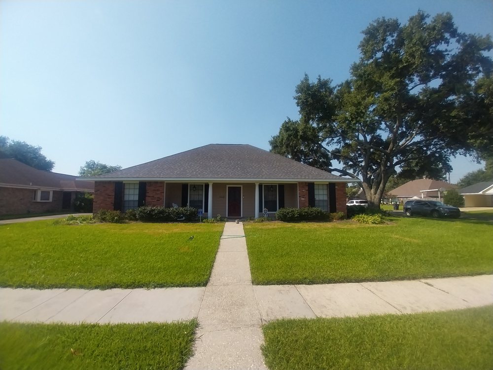 Slide of Signature Roofing & Construction