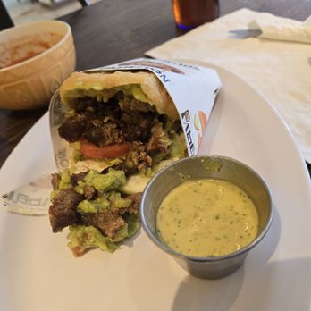 Pabellon - Llanera arepa with steak and guasacaca green sauce - Mexican Near Me - Pittsburgh, Pennsylvania