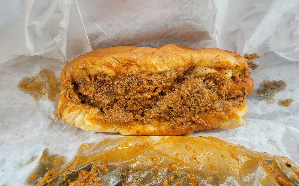 Walt's Wurl Famous Hot Dawgs Logo