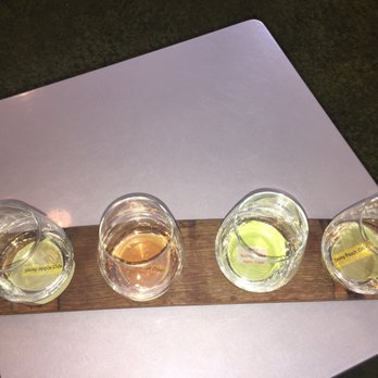 Small Talk Vineyards - Here are the samples of their four ciders! My favorite was the bootleg one (center-right). - Wineries Near Me - Niagara On the Lake, Ontario Small Talk Vineyards - Here are the samples of their four ciders! My favorite was the bootleg one (center-right). - Wineries Near Me - Niagara On the Lake, Ontario