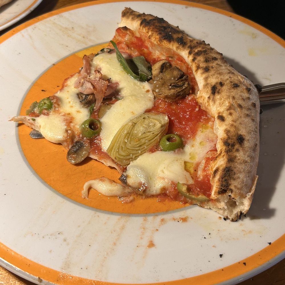 Quattro stagioni pizza Quattro stagioni pizza