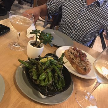 The Cut - A glass of Sauvignon Blanc, the Clementhyme, Shishito Peppers, and the Pork Toast. - Burgers Near Me - Irvine, California The Cut - A glass of Sauvignon Blanc, the Clementhyme, Shishito Peppers, and the Pork Toast. - Burgers Near Me - Irvine, California