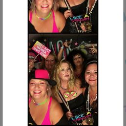 a group of women posing for a picture