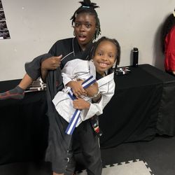 Tiger-Rock Martial Arts of Lawrenceville - Trinity having fun with one of the instructors