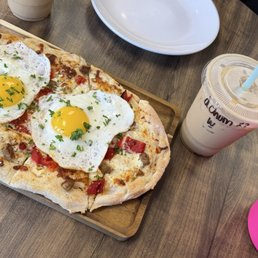 Breakfast pizza (substituted bacon for chicken sausage) + iced chumpkin chai with a shot of espresso