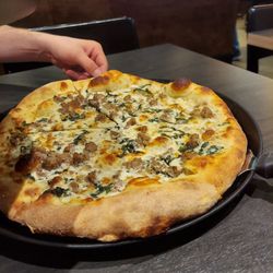 Boom’s Pizza - Build your own white pizza with sausage and basil