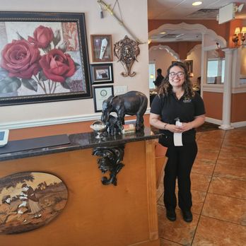 Amrit Palace - Entry and awesome hostess!! Talked us through the entire menu with a smile. Def coming back - Indian Near Me - Ocala, Florida