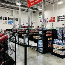 WinCo Foods - Wide open self checkout that you are stopped from using if too many items.
