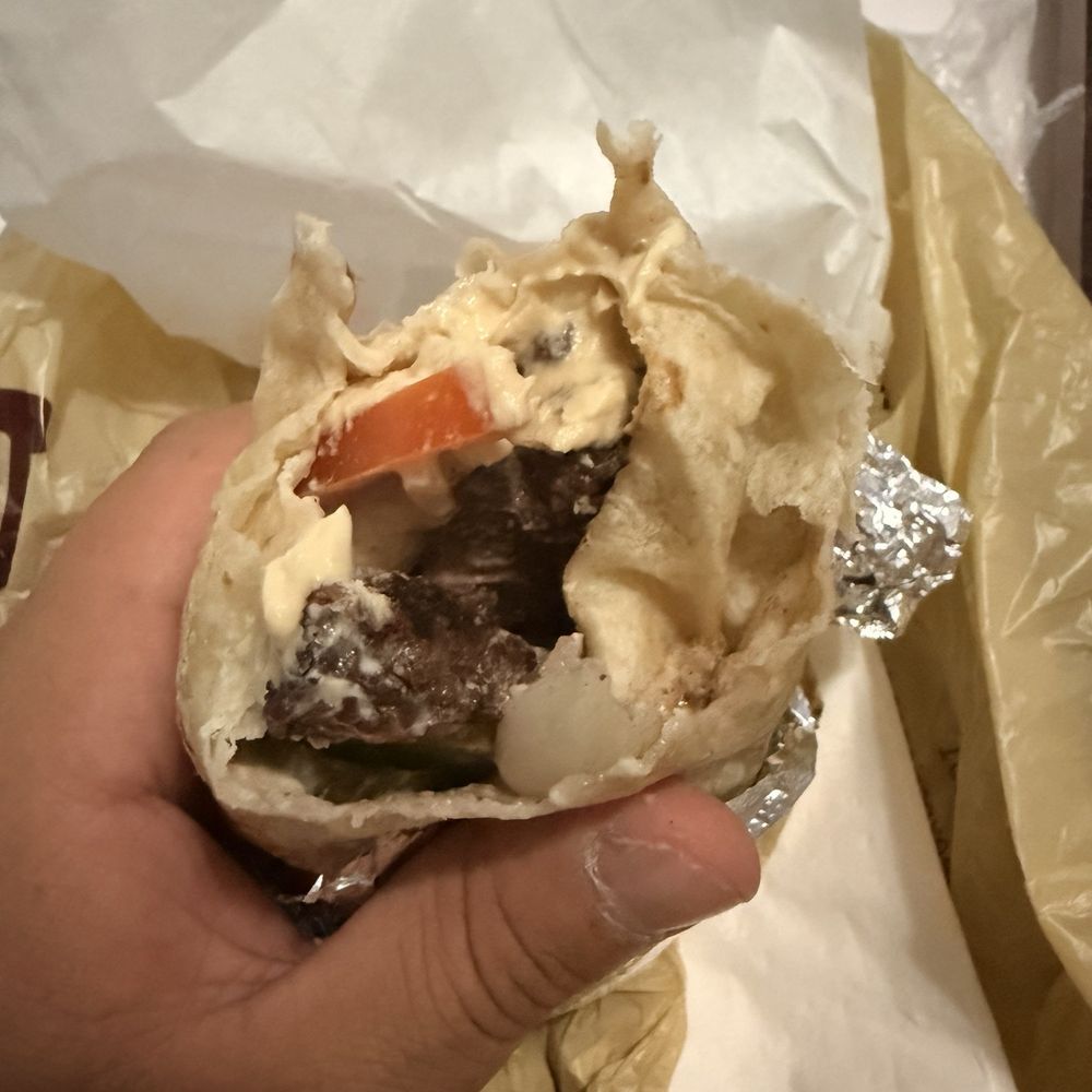 Vegetables were at the bottom of the wrap Vegetables were at the bottom of the wrap