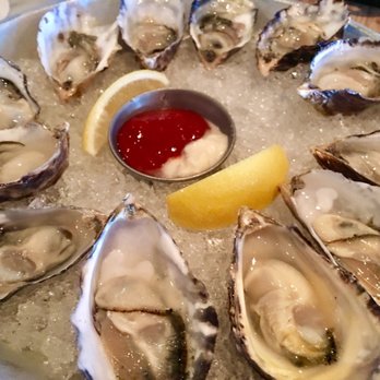 Fleetwood's on Front St - $1 oysters for happy hour. I am happy. - New American Near Me - Lahaina, Hawaii