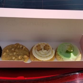 Crumbl - Glendora - Left side Molten lava,  white chocolate,  graham crackers with teddy bear,  then limeade on the right - Bakeries Near Me - Glendora, California