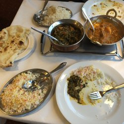 Shapla Tandoori Restaurant - Clockwise from naan: coconut rice (too sweet), chicken palak, chicken tikka Balti, saffron rice.