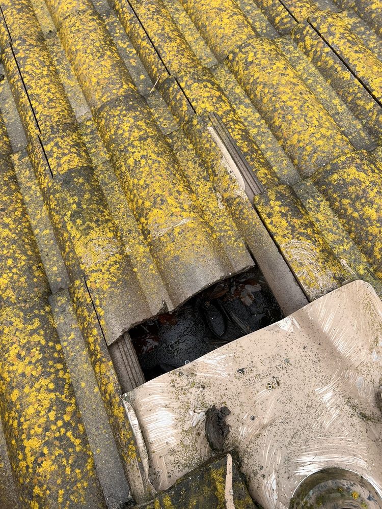 Slide of Maginis Roofing