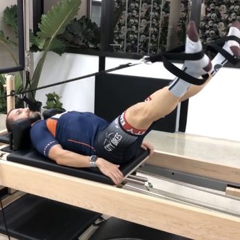 Sala Pilates - Triathlete Flavio during his private Pilates session on Reformer at Sala Pilates in Coral Gables - FL - Pilates Near Me - Coral Gables, Florida Sala Pilates - Triathlete Flavio during his private Pilates session on Reformer at Sala Pilates in Coral Gables - FL - Pilates Near Me - Coral Gables, Florida