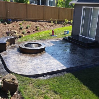 Mitchell Concrete - Stamp patio with fireplace and radius bench - Masonry/Concrete Near Me Mitchell Concrete - Stamp patio with fireplace and radius bench - Masonry/Concrete Near Me