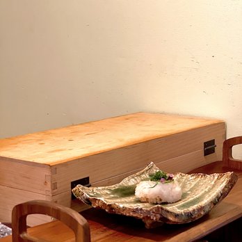 Tetsu Sushi Bar - a wooden table with a bowl of sushi on it - Japanese Near Me - Vancouver, British Columbia Tetsu Sushi Bar - a wooden table with a bowl of sushi on it - Japanese Near Me - Vancouver, British Columbia