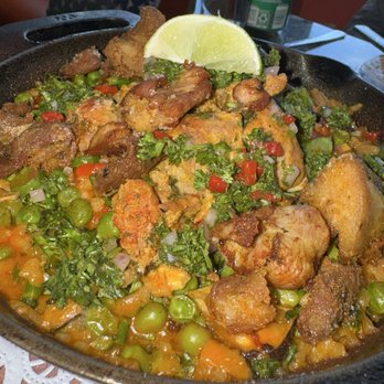 Cafe Americana - Jerk Chicken Paella - Tapas/Small Plates Near Me - Arlington, Texas Cafe Americana - Jerk Chicken Paella - Tapas/Small Plates Near Me - Arlington, Texas