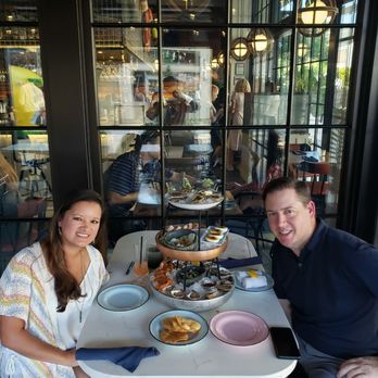 Plank Provisions - Outdoor patio dining was not hot and still great atmosphere. Check out the impressive seafood tower between us! - Seafood Near Me - Austin, Texas Plank Provisions - Outdoor patio dining was not hot and still great atmosphere. Check out the impressive seafood tower between us! - Seafood Near Me - Austin, Texas