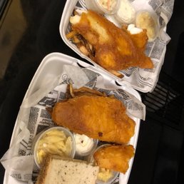 two trays of fish and chips