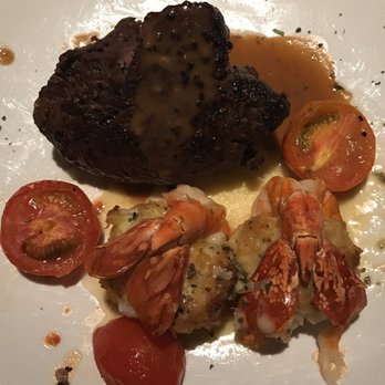Fleming’s Prime Steakhouse & Wine Bar - Petite filet mignon and crab stuffed colossal shrimp scampi - Steakhouses Near Me - Tucson, Arizona Fleming’s Prime Steakhouse & Wine Bar - Petite filet mignon and crab stuffed colossal shrimp scampi - Steakhouses Near Me - Tucson, Arizona