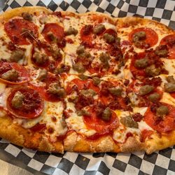 Cannery Pizza - Sausage, pepperoni, and bacon pizza