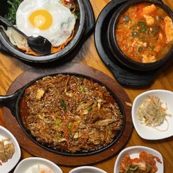 One Family Korean Restaurant - Bibimbap (left), sundubu-jjigae (spicy tofu stew), and spicy pork bulgogi (bottom)