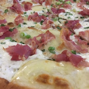 Juliana's - Pizza special no. 1: pancetta, mozzarella, scallions, scamorza affumicata, white truffles, olive oil - Pizza Near Me - Brooklyn, New York Juliana's - Pizza special no. 1: pancetta, mozzarella, scallions, scamorza affumicata, white truffles, olive oil - Pizza Near Me - Brooklyn, New York