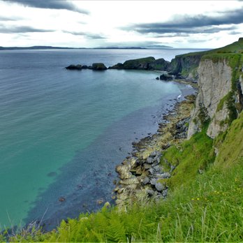 Carrick-a-rede Rope Bridge - The majestic coastline. - Local Flavor Near Me - Ballintoy, ANT