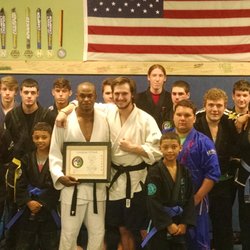 Toe 2 Toe Martial Arts - New Black Belts and the next crop of aspiring students.
