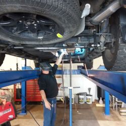 Mufflers & More - Alex at work