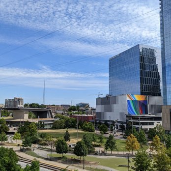John Seigenthaler Pedestrian Bridge - The rainbow building is the Hampton Rooftop. It's a part of a restaurant with a lounge. - Landmarks & Historical Buildings Near Me