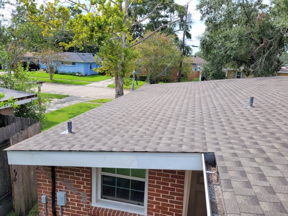 Slide of Del's & Son Roofing