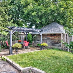 Fairfield Residence Assisted Living For Seniors - The back garden features an apple tree, vegetable garden, and a gazebo where we host celebrations, birthday parties, and BBQs.