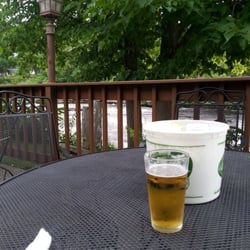Riverview - Table on the patio with the waterfalls sounds in the background