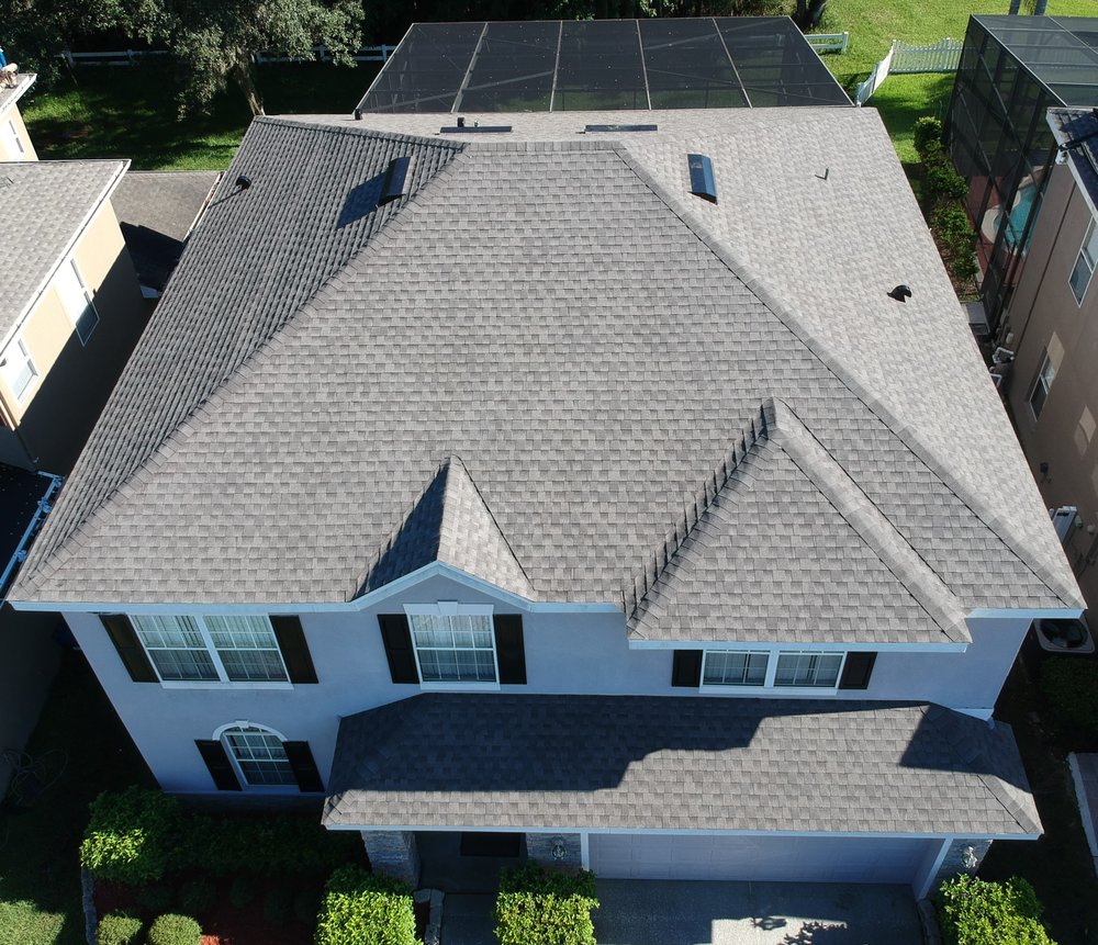 Slide of One World Roofing