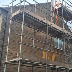 N.G. Plastering - Gable end being ground out and repointed in garforth leeds