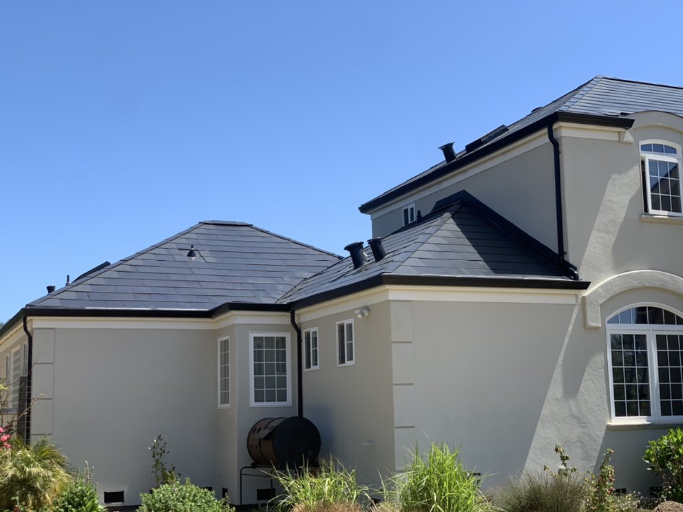 Slide of RidgeValley Roofing