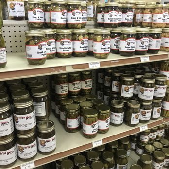 We're Nuts - jars of pickles on a shelf - Farmers Market Near Me - Vienna, Georgia