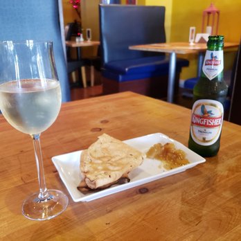 RV’s Butter Kitchen - a plate of food and a glass of wine - Indian Near Me - Vancouver, British Columbia RV’s Butter Kitchen - a plate of food and a glass of wine - Indian Near Me - Vancouver, British Columbia