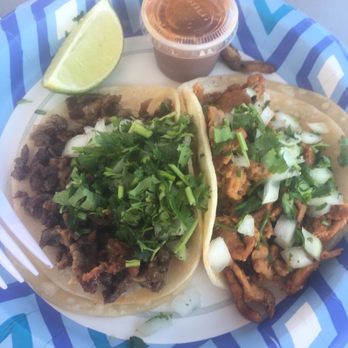 Ta'corriendo - two tacos on a plate - Food Trucks Near Me - Hillsboro, Oregon Ta'corriendo - two tacos on a plate - Food Trucks Near Me - Hillsboro, Oregon