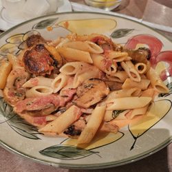 Mezzaluna II - Penne with sausage and mushrooms