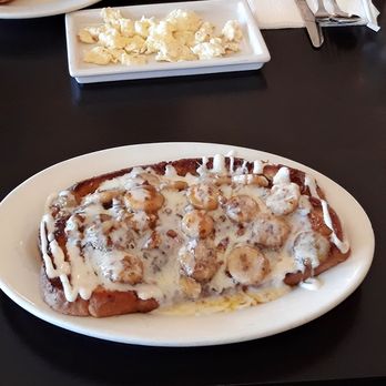Toasterz Cafe - Love the Texan saying "Always Bigger In Texas" So delicious French Toast with fresh bananas and pecan - Breakfast & Brunch Near Me - Houston, Texas