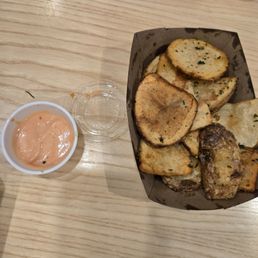Small side of fries with nice,  tasty sauce