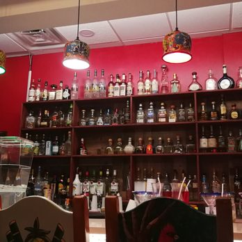 Tulcingo Mexican Restaurant - bottles of alcohol on shelves - Mexican Near Me - Monroe, New York