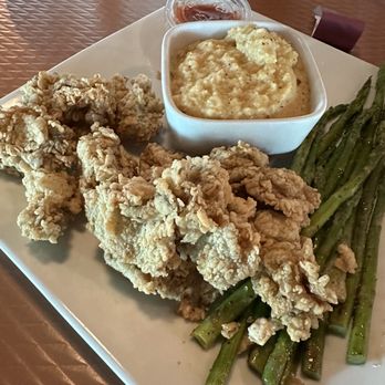 The Jellyfish - Fried oysters and smoked Gouda grits - Seafood Near Me - Pensacola, Florida The Jellyfish - Fried oysters and smoked Gouda grits - Seafood Near Me - Pensacola, Florida