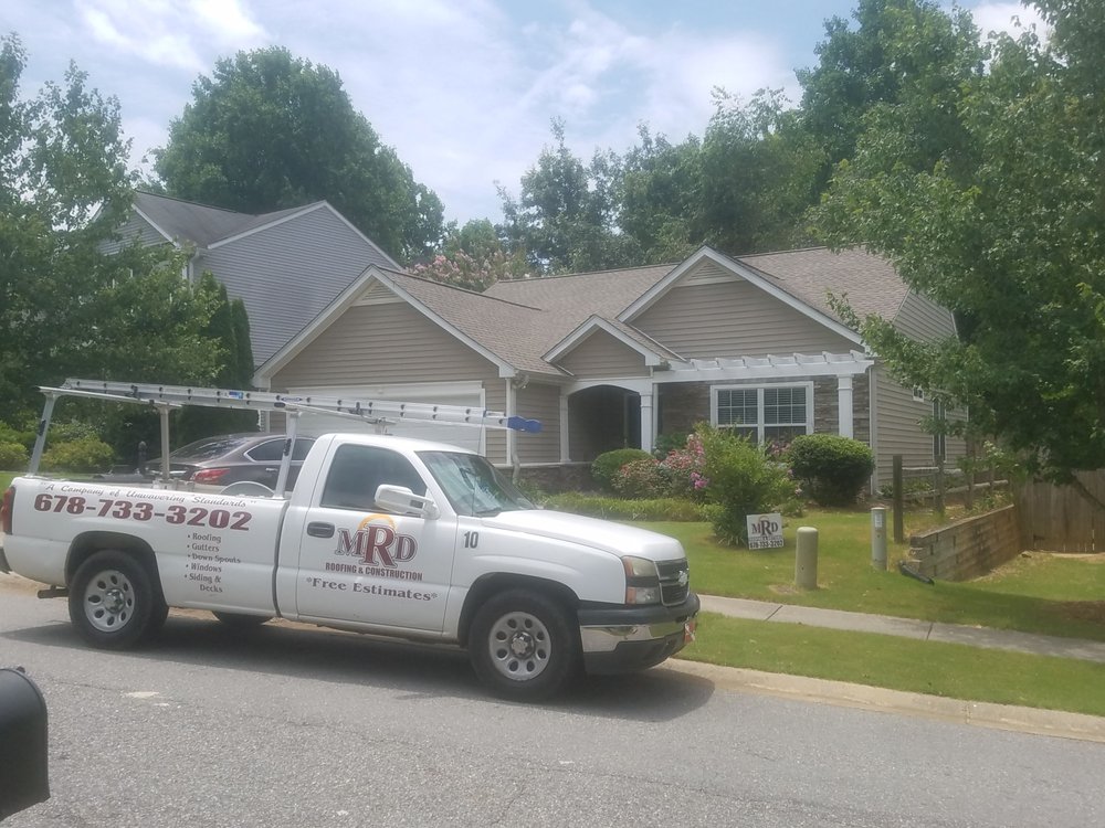 Slide of MRD Roofing & Gutters